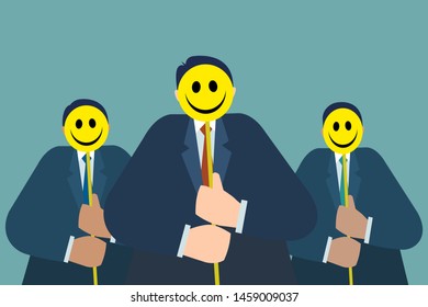 Group of men hold yellow smiling masks to cover their faces