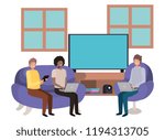 group of men using technology in the livingroom
