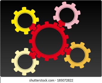 Group of multicolored gears on a black background