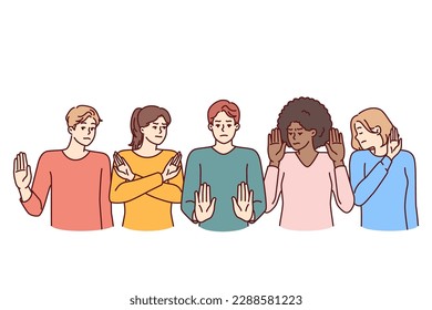 Group of multiethnic people show stop gestures not wanting to accept discrimination. Multi-ethnic coalition of staff or students express negative emotions and protest against unacceptable actions