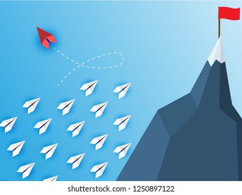 Group of paper plane in one direction and with one individual pointing in the different way. Business concept for new ideas creativity and innovative solution.