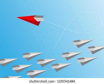 Group of paper plane in one direction and with one individual pointing in the different way. Business concept for new ideas creativity and innovative solution.