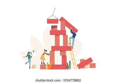 Group of people build a random shape blocks