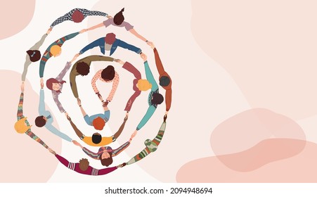 Group of people in circle from diverse culture holding hands.Cooperation and teamwork.Community of friends or volunteers committed to social issues for peace and the environment.Top view - Shutterstock ID 2094948694