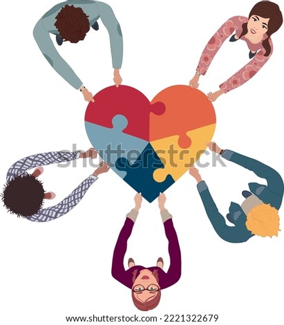 Group of people in circle top view multicultural volunteers holding a heart with puzzle pieces. NGO. Aid. Community of friends or volunteers for help or social assistance. Teamwork