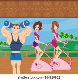 a group of people exercising in the gym