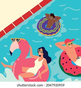 grupos de personas con flotas en la piscina
