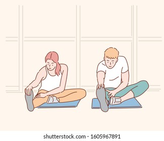 Group of people at the gym stretching. Hand drawn style vector design illustrations.