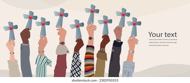 Group of people hands raised holding a crucifix. Christian worship.Concept of faith and hope in Jesus Christ. Copy space banners.Evangelical Christians - Protestants - or Catholics