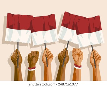 A group of people holding up Indonesia flags. Indonesia independence day