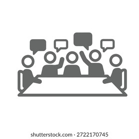 Un grupo de personas está sentado alrededor de una mesa y hablando