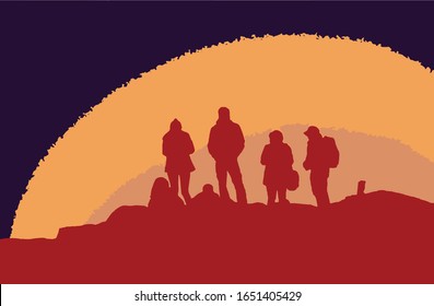 A group of people standing on the top of the hill