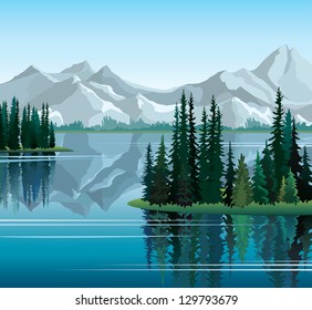 Group of pine trees reflected in calm still water with mountains on a  background