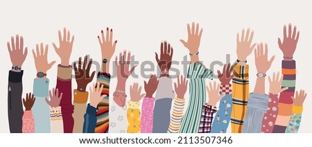 Group of raised hands and arms of multicultural men women and children.Community of people of diverse culture.Diversity people.Concept of multi-ethnic families.Friendship and cooperation