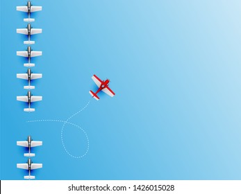 Group of red plane in one direction and with one individual pointing in the different way. Business concept for new ideas creativity and innovative solution. Teamwork business.