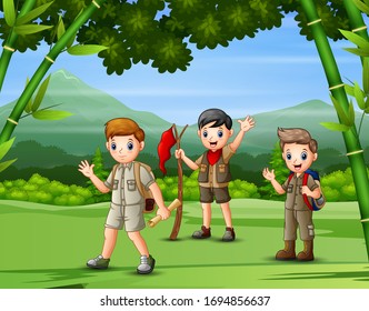 A group of scouts hiking in the forest