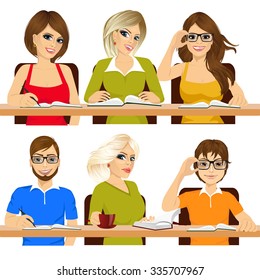 group of students studying together working writing notes 