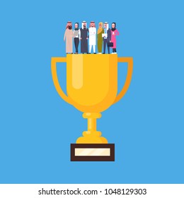 Group Of Successful Arab Business People Standing At Golden Cup, Muslim Businesspeople Success Team Concept