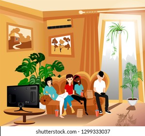 group of teenagers sitting on the couch in the living room