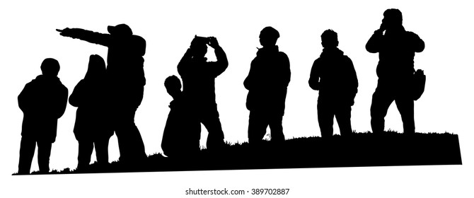 Group of tourist on the top of the hill vector silhouette illustration isolated. People traveling and having a rest. Hikers travelers with camera enjoying view from mountain. Rescue team observers.