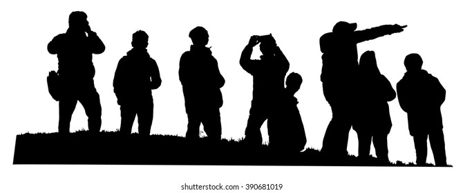 Group of tourist on the top of the hill vector silhouette illustration isolated. People traveling and having a rest. Hikers travelers with camera enjoying view from mountain. Rescue team observers.