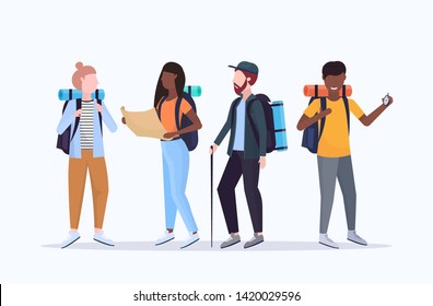 group tourists hikers with backpacks holding compass and travel map searching direction hiking concept mix race travelers on hike full length white background flat horizontal