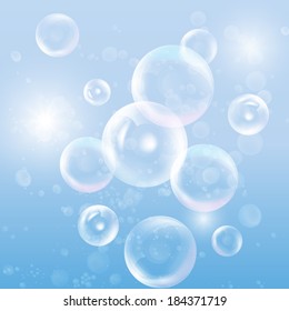 Group of transparent spheres on a blue background vector