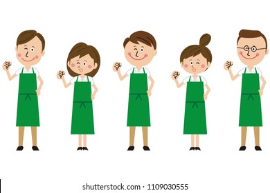 The group wearing a green apron gets motivated pose