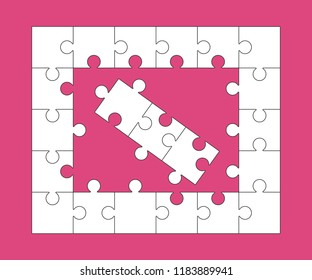 Group of white paper jigsaw puzzles