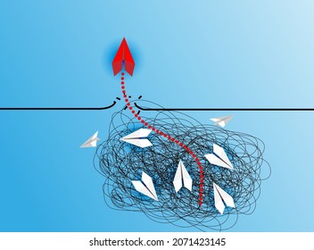 Group of white paper planes fly in a circle and one red paper plane pointing in different way on blue background. Business for new ideas creativity, innovative and solution concept.