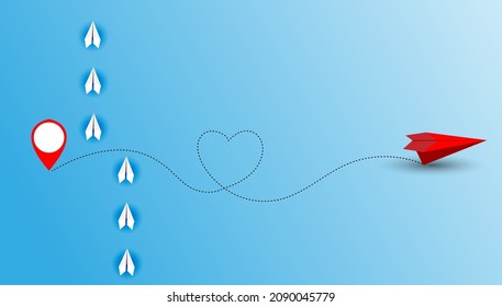 Group of white paper planes fly in a circle and one red paper plane pointing in different way on blue background. Business for new ideas creativity, innovative and solution concept.