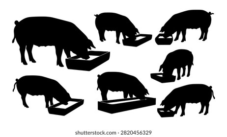 Group of wild boars feeding on the ground in a natural environment silhouette style.