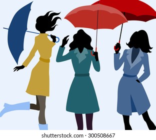 Group of women in autumn with umbrellas