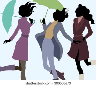 Group of women in autumn with umbrellas