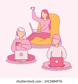 group of women seated using laptop computer