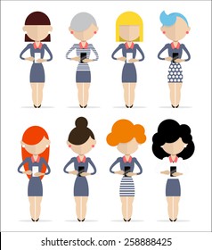 Group of women standing with cell phones in different poses.