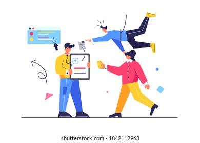 A group of workers working on projects in a team