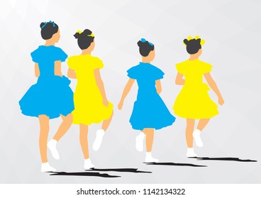 A group of young girls dancing synchronously