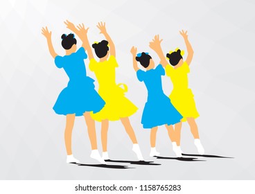 A group of young girls dancing synchronously