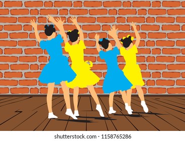 A group of young girls dancing synchronously