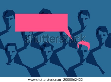 A group of young men where one man stands out from the rest by pink hair and speech bubble
