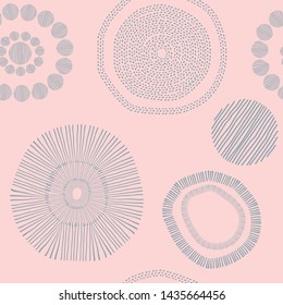 Groups of rings and textured gray circles on a pink background, creating a harmonious and pleasant set. The rings and circles are made with lines and dots.