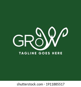 Grow word stylized text. Letters with green leaf in a W letter. Gardening theme logo.