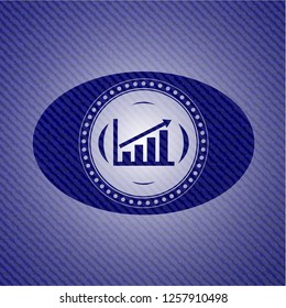 growth chart icon inside badge with denim texture