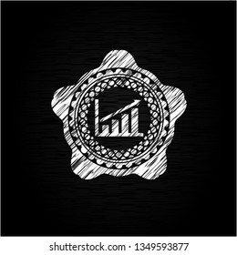 growth chart icon inside chalkboard emblem written on a blackboard