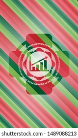 growth chart icon inside christmas style badge..