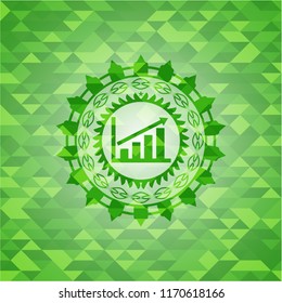 growth chart icon inside green emblem with mosaic ecological style background