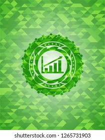 growth chart icon inside green mosaic emblem