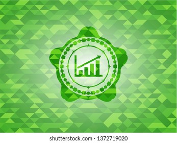 growth chart icon inside green emblem with triangle mosaic background