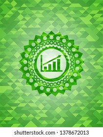 growth chart icon inside green emblem with mosaic background